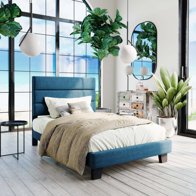 Lit plateforme Elison avec tête de lit tapissier en tissu et lattes en bois