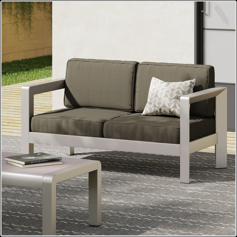 Causeuse d'extérieur en aluminium avec assise profonde et structure AVIara pour une détente élégante sur le patio
