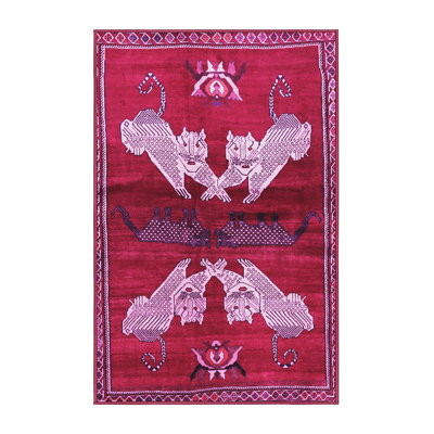 Tapis rose tissé à la machine