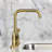 Kingston Brass Continental Two-Handle 4-Hole Deck Mount Bridge Kitchen Faucet with Brass Side Sprayer-103181214