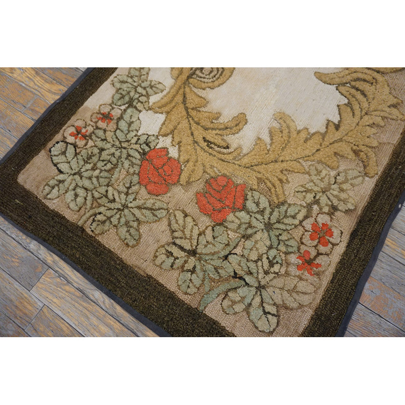 Antique Late 19th Century Solid Ivory Cream Color Field American Folk Art Floral Wreath Hooked Rug