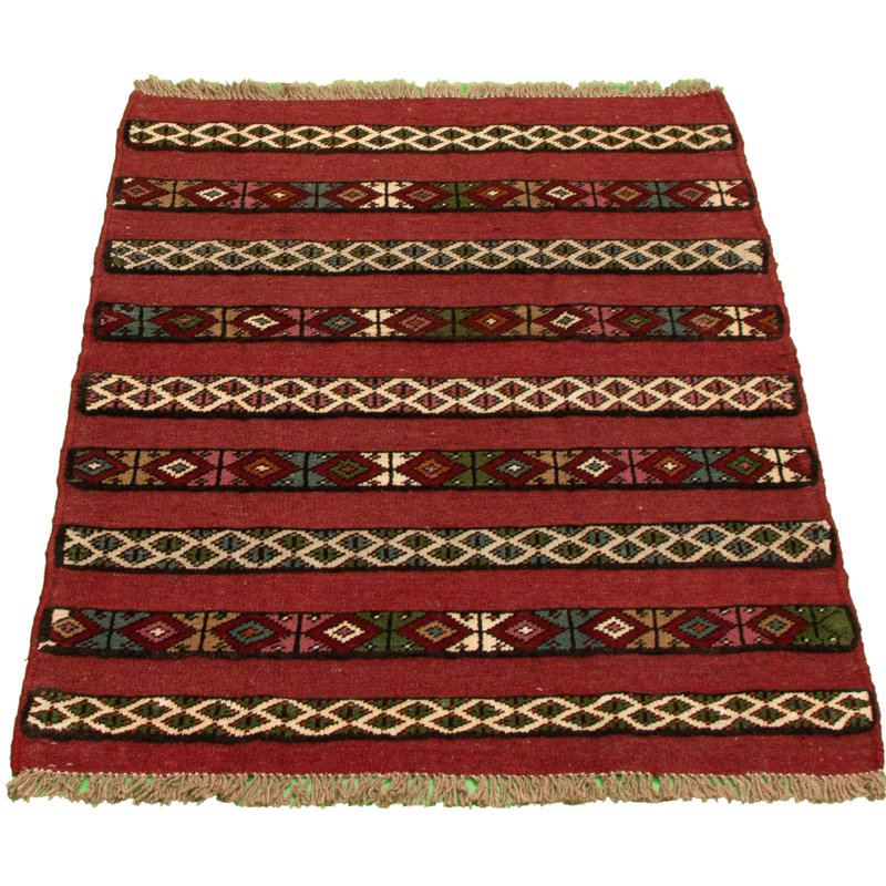 Tapis rouge foncé en laine noué à la main