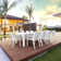 Farrah 11 Piece Dining Set With Extension Table And Sling Arm Chairs