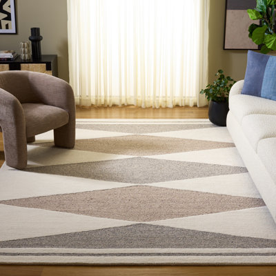 Tapis en laine / coton touffeté à la main Manhattan 477 ivoire / gris Manhattan