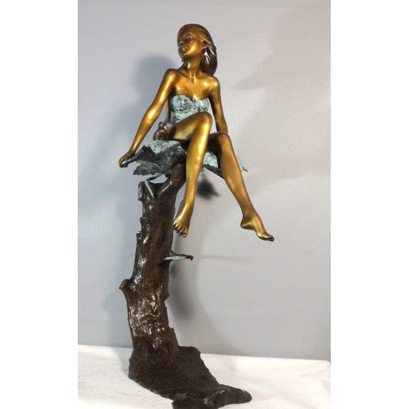 Girl sitting on maple