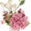 Hortensia et renoncule disposés en pot en céramique