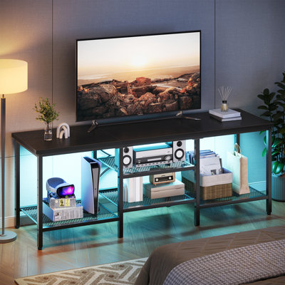63" LED TV Stand For Tvs Up To 75" Media Console With Adjustable Shelf And Open Storage by Wrought Studio