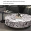 Table basse ronde moderne en marbre-110567724