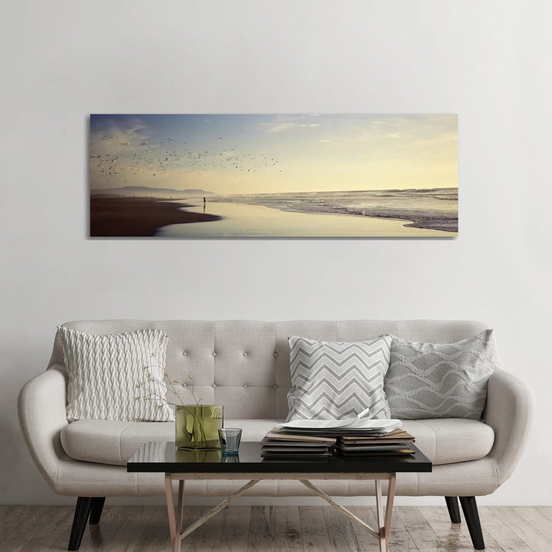 Flock Of Seagulls Flying Above A Woman On The Beach, San Francisco, California, USA - Wrapped Canvas Panoramic Print