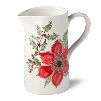 Festive Blooms Pitcher — A generous 68-ounce white stoneware pitcher painted with a bold scarlet bloom and holiday botanicals, bringing festive beauty to every pour of the season.