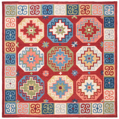 Vahakn Hand Tufted Wool/Cotton Southwestern Rug in Blue/Red