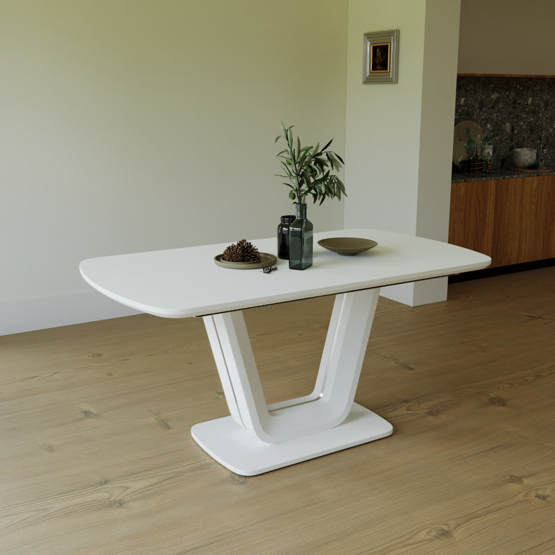 Table de salle à manger moderne extensible en bois aggloméré avec pieds en forme de U, durable et élégante