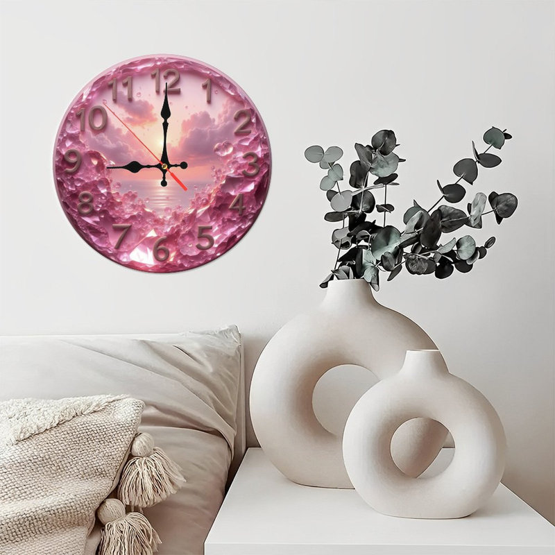Horloge en cristal rose avec coucher de soleil
