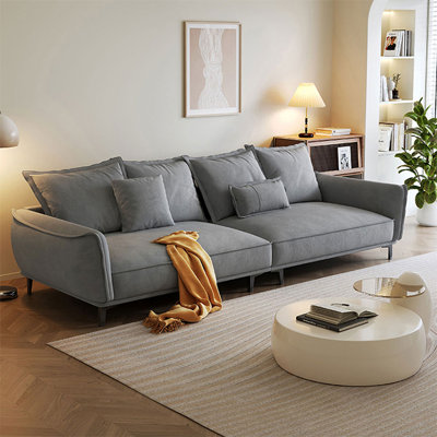 Canapé modulaire en velours gris avec coussins