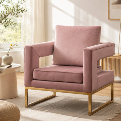 Fauteuil d'appoint chic et rembourré au design unique, offrant confort et style pour votre espace de vie.
