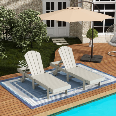 Ensemble de chaises longues inclinables extérieures en poly Lagune