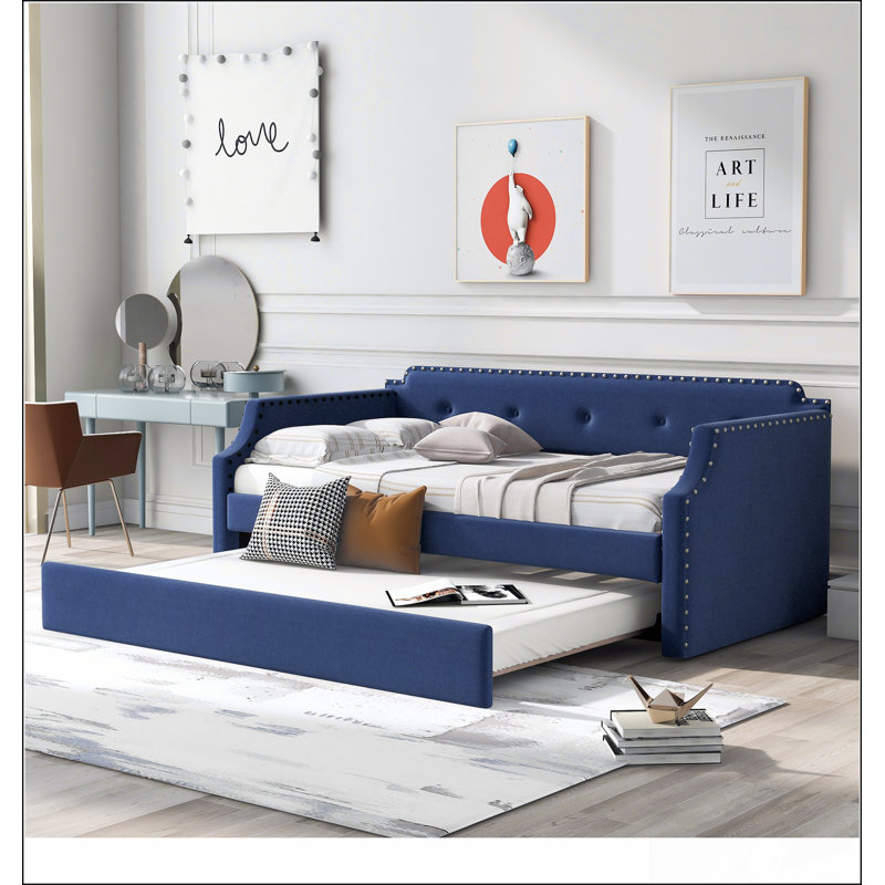 Lit de jour rembourré avec support pour lit gigogne et lattes de bois, combinant une conception classique et un sommeil confortable pour les invités