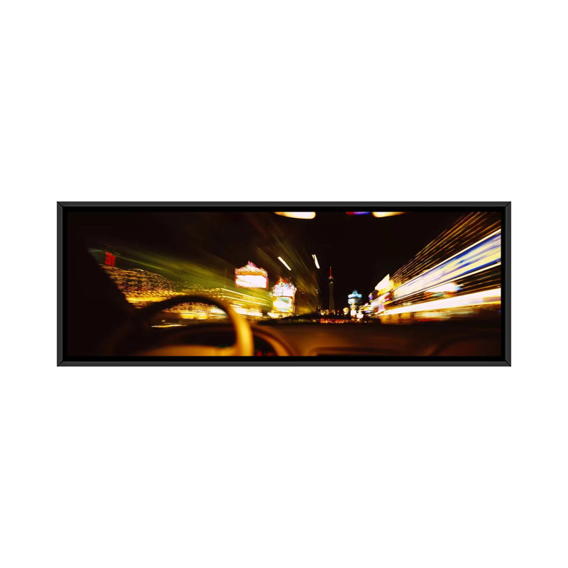 " Car On A Road At Night, Las Vegas, Nevada, USA " by Panoramic Images, 12" H x 36" W x 1.5" D, Black Framed Canvas