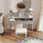 Ensemble de meuble-lavabo réglable luxueux avec plusieurs tiroirs et tabouret-745664086