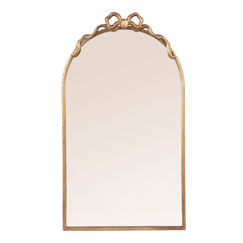 Miroir arqué en fer doré avec nœud décoratif