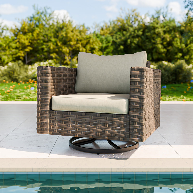 Fauteuil oscillant pivotant avec coussins Wicker