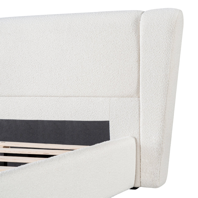 Lit plateforme Quilla moderne à oreilles capitonnées avec tissu bouclé, lattes en bois massif et tête de lit rembourrée - Chambre à coucher à l'ambiance feutrée