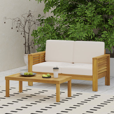Charmant ensemble de meubles d'extérieur en bois d'acacia avec coussins moelleux pour la détente