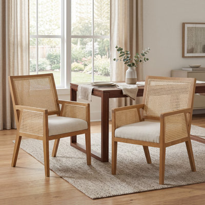 Calira Mid-Century Coastal Rubberwood Rattan Upholstered Dining Chair with Armrests and Cushioned Seat