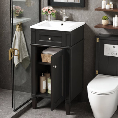 Meuble-lavabo moderne noir français avec lavabo en céramique, porte à fermeture douce et tablette de rangement