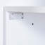 Lit escamotable avec tablettes ouvertes, tiroirs de rangement, armoire encastrée et table pour les espaces de chambre multifonctionnels