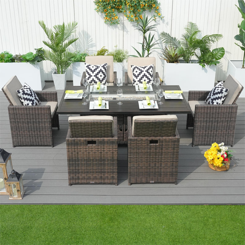 Takuya 6 - Person Wicker Patio Dining Set with Rectangular Table , Cushions Included, Brown