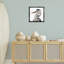 "Stoic Heron" regardant à gauche sur toile flottante encadrée par Roozbeh Bahramali-638672233-638672235