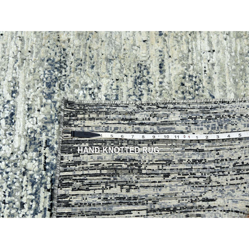 Tapis noir en laine nouvel âge 6 pi x 9 pi Poisson unique