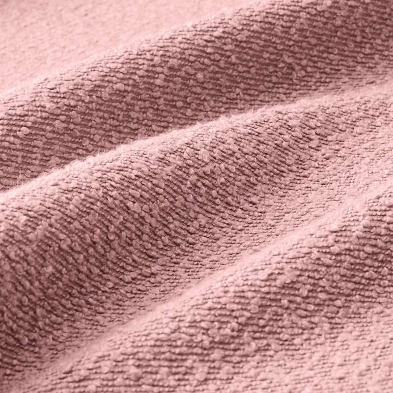 Canapé convertible en L rose à 4 places en tissu bouclé avec pieds en forme de coquillage, amovibles et cylindriques. Structure de sièges confortables pour le salon avec des espaces de confort de conception moderne