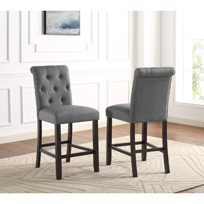 Tabouret à hauteur de comptoir en bois massif touffeté 2 pièces Leviton, gris