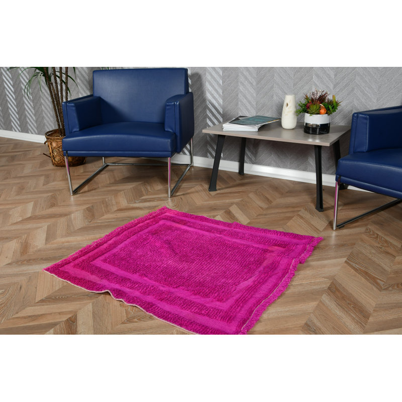 Soft Pink Handcrafted Rug Perfect For Adding A Touch Of Charm And Warmth To Any Room In Your Home