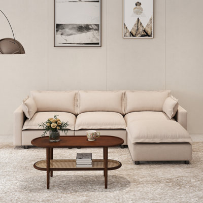 Canapé rembourré avec table basse et repose-pieds