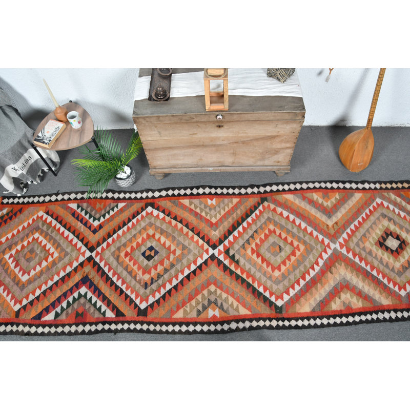 Tapis de style kilim turc rétro fait à la main dans des motifs géométriques éclatants pour un décor bohémien rouge / beige