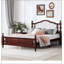 Grand lit en cerisier avec une construction durable et un design élégant, parfait pour un confort et un style durables.