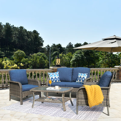 Jago Patio 4 Piece Rattan Sofa Seating Group with Cushions