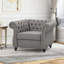 Fauteuil club capitonné