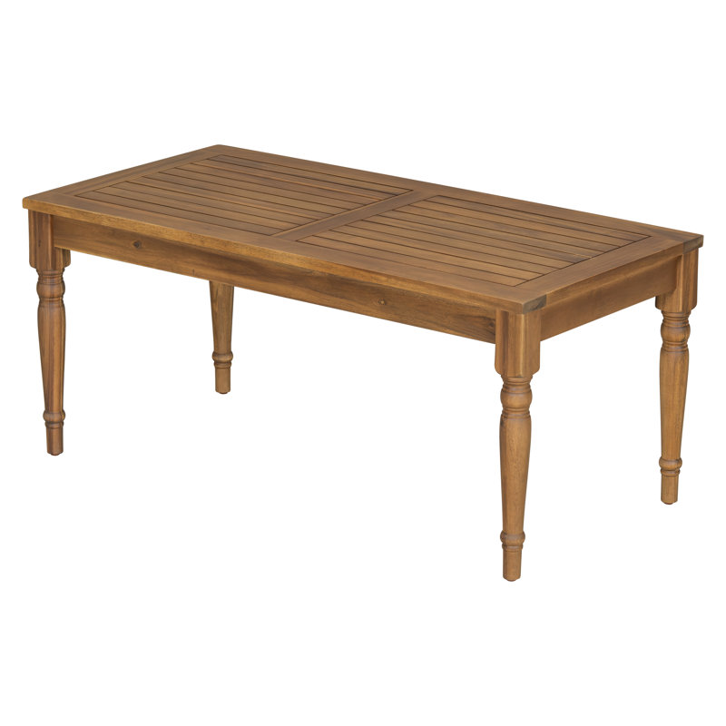 Table basse de patio en bois d'acacia avec pattes sculptées Parker