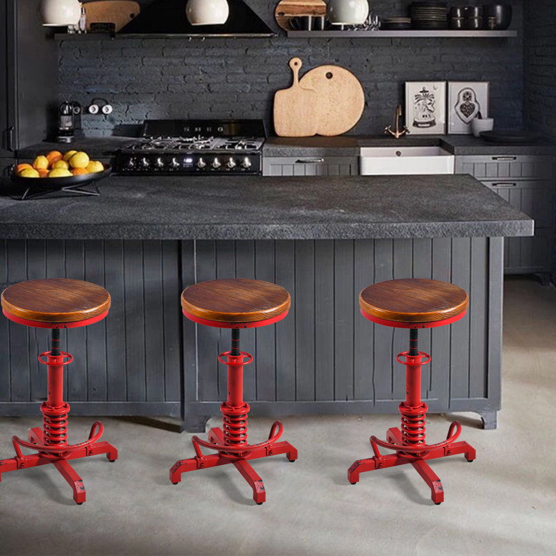 Tabouret pivotant en bois massif Jaitun, Rouge antique