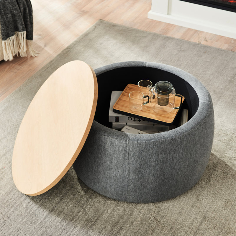 Rangement rond - 2 po 1. Fonctionne comme table de bout et. Revêtement en lin gris foncé. Fait à la main. 25,5 po x 25,5 po x 14,5 po. Capacité de poids de 250 lb, 1 fonction, et gris. Fabriqué à la main avec 250 lb. Aucun assemblage requis