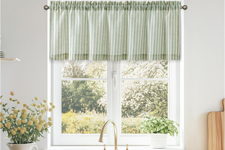 green striped valance hanging in neutral kitchen