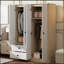 Élégante garde-robe à 4 portes avec plusieurs options de rangement pour votre chambre à coucher