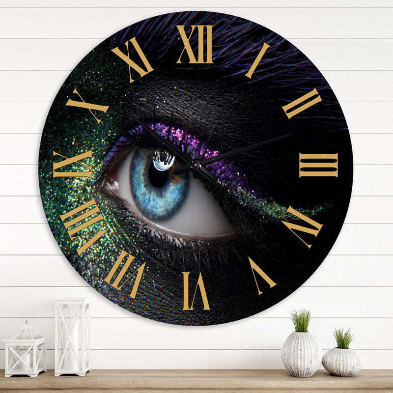 Horloge murale moderne avec yeux féminins et pigments verts et mauves, Grand