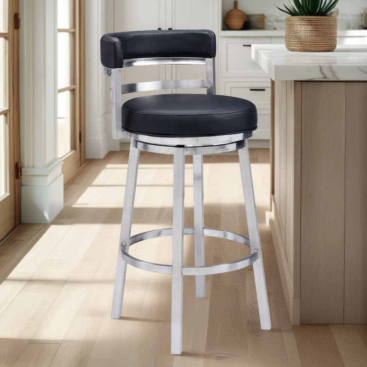 Deherrera Modern Swivel Counter or Bar Stool with Open Low Back and Footrest in Metal and Faux Leather