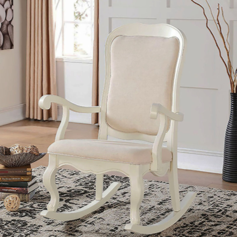 Chaise berçante avec pieds cabriole