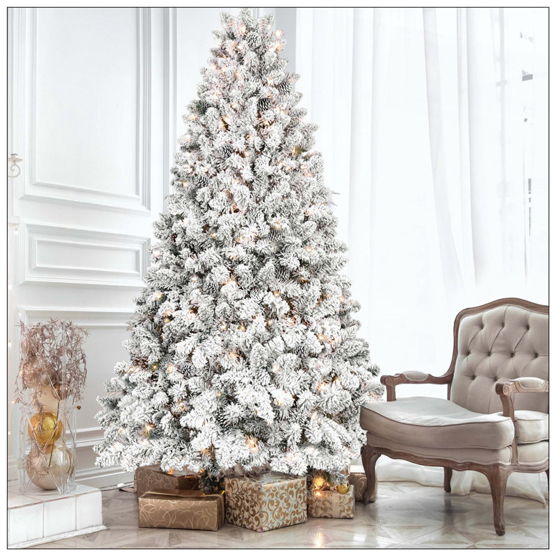 Arbre de Noël floqué avec cônes - pointes en PVC enneigées, structure à charnières, support en métal stable, installation facile